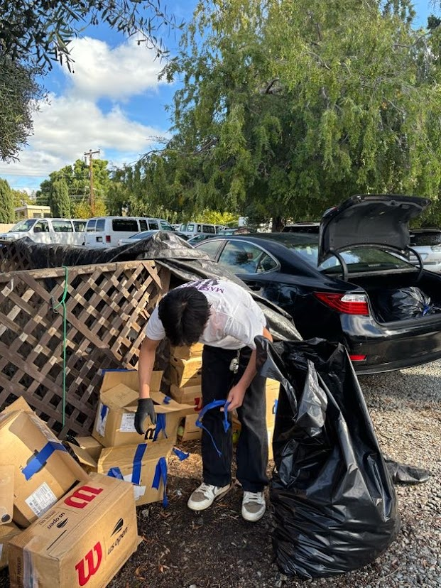 Loading collected materials at a community collection drive